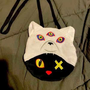Weird little Meow Wolf crossbody bag from Omega Mart in Las Vegas 😍